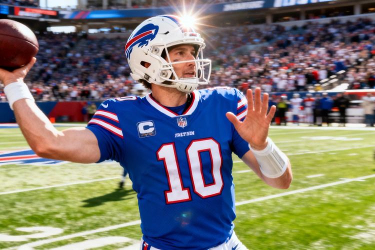 Josh Allen throws a football during a Bills playoff game.
